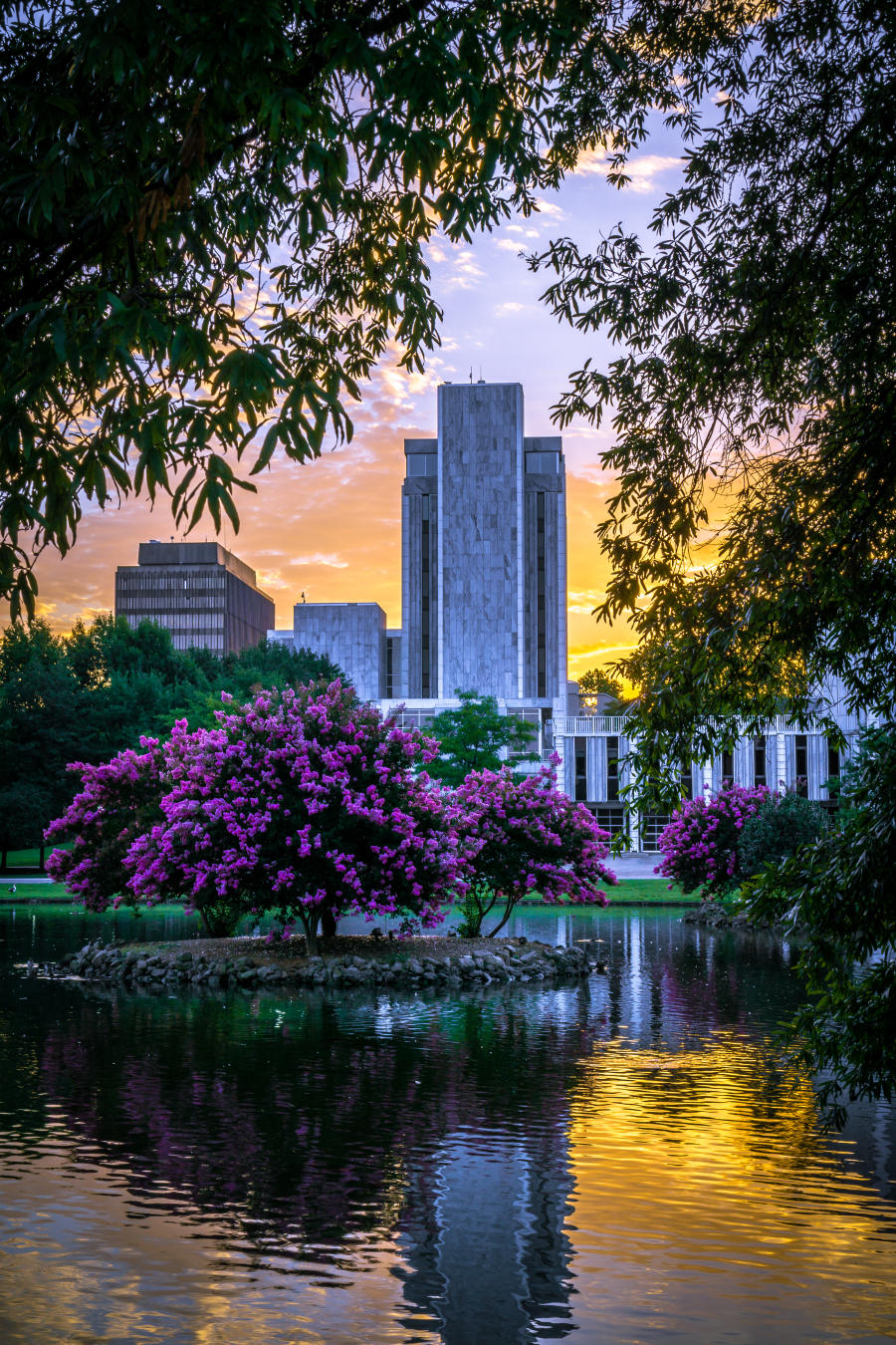 Springtime flowers paint the landscape of Big Spring Park near the Huntsville City Hall.