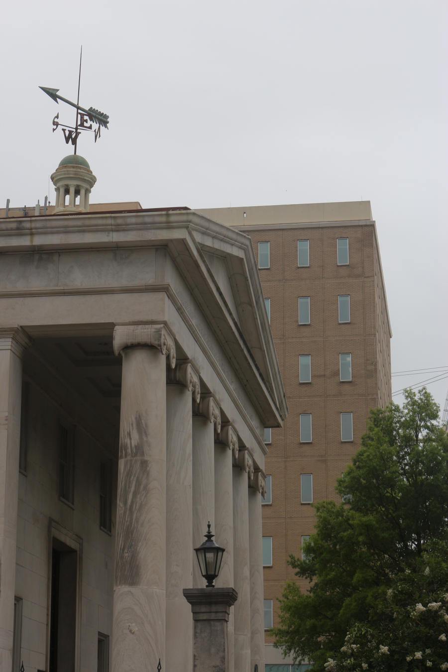 Once part of the previous Courthouse, the weather vane and cupula are now part of the First National Bank in Huntsville.
