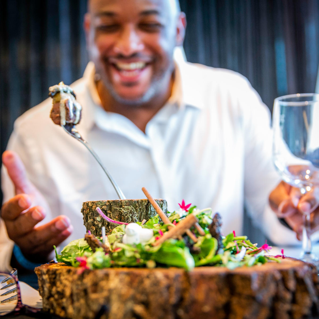 Man with food at Wine and Food Week in The Woodlands, Texas