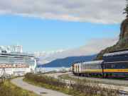 The Alaska Railroad nears a cruise ship in Whittier