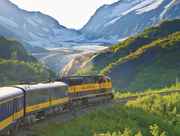 Alaska Railroad train passes a Glacier in Grandview