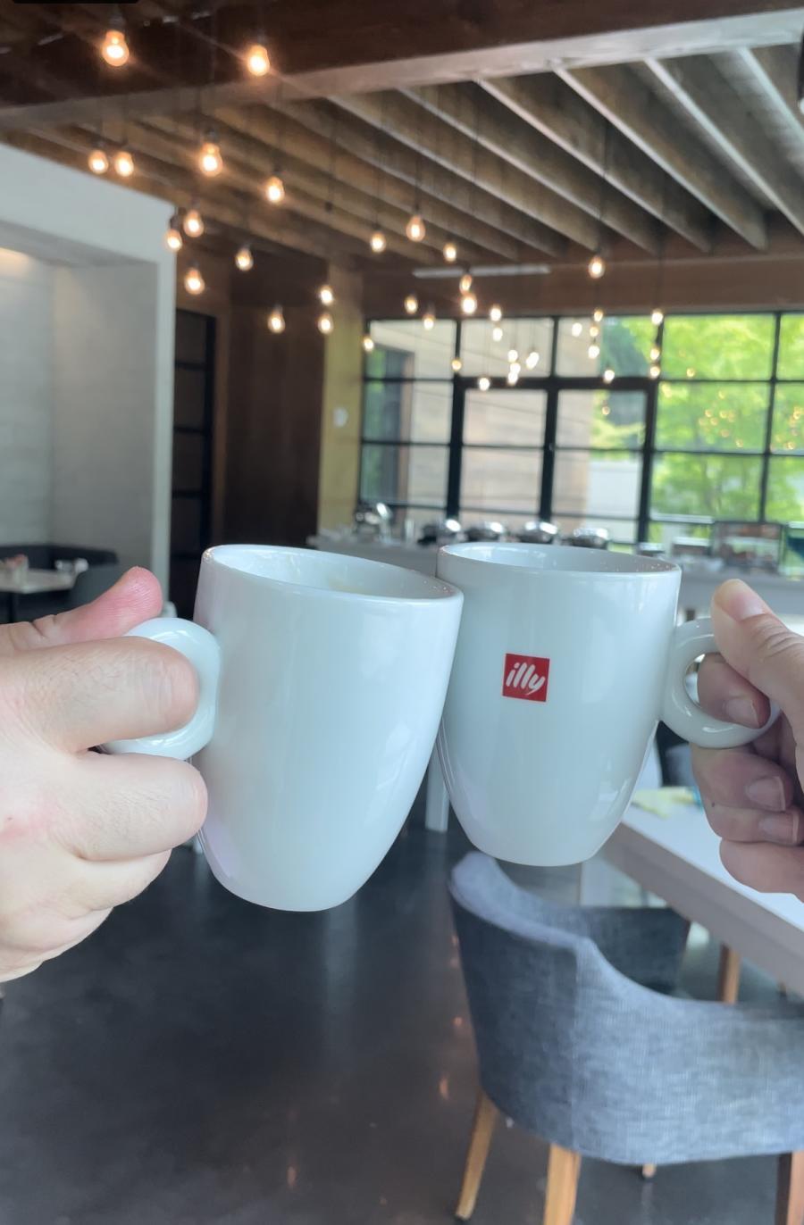 Cheers Coffee Mug Clink at Portico Brunch