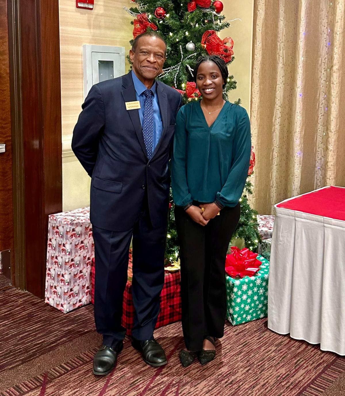 Grace Sarfo, the first recipient of the Visit Albuquerque Scholarship Honoring Larry Atchison, with Larry Atchison