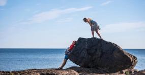 Couple by a rock