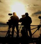 Film crew at sunset