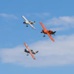 Formula One class racer turning in flight.