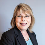Staff headshot of Director of Administration Charlotte "Charlie" Rice