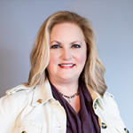 Staff headshot of Vice President of Marketing and Communications Katharyn DeVille