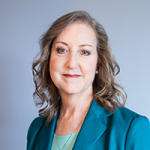Staff headshot of President and CEO Stacy Brown