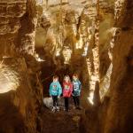 Picture of three kinds exploring Lincoln Cavers