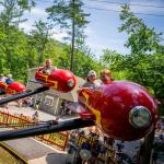 Picture of kids riding and Amusement Park ride at Knoebels