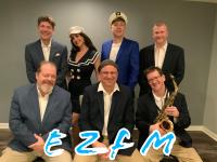 Promotional photo of the band EZFM playing at Concerts in the Park 2025.