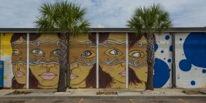 Mural art of a woman in a mask