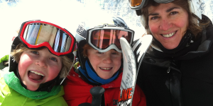 A family riding the chairlift