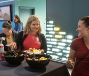 Event attendees treat themselves to a breakfast buffet