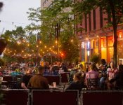 Patrons fill a downtown Madison streatery on a spring evening