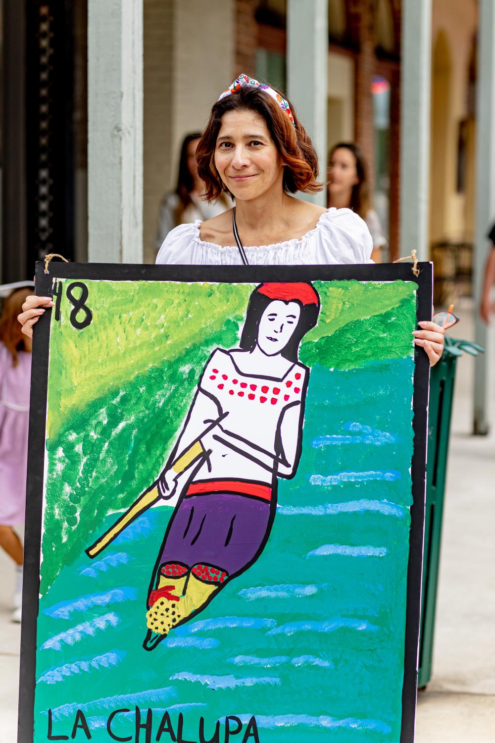 Woman holding giant Loteria!