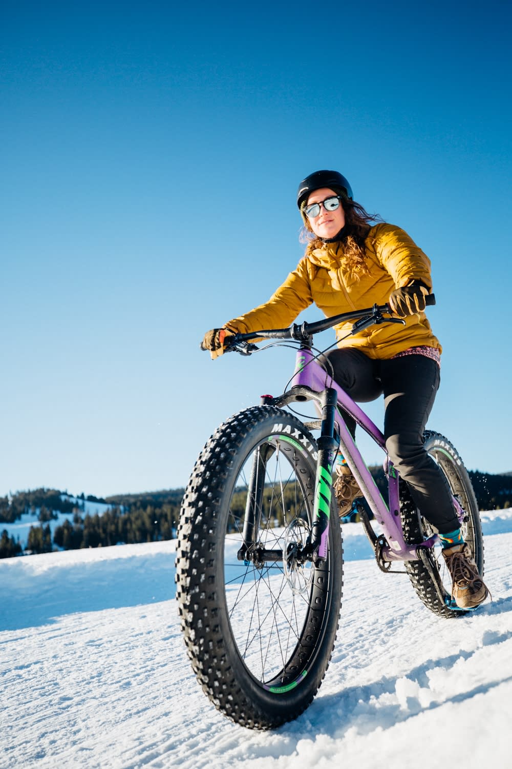 A man rides a fat bike during winter in Big Sky photo by Jonathan Finch