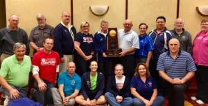 OVR Board members with NCAA Volleyball Trophy
