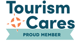 Blue Tourism Cares logo showing proud member with orange star design