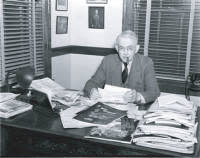 Hugh J. Gray at his desk
