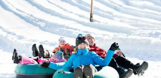 Family enjoying snowtubing at Gorgoza Park