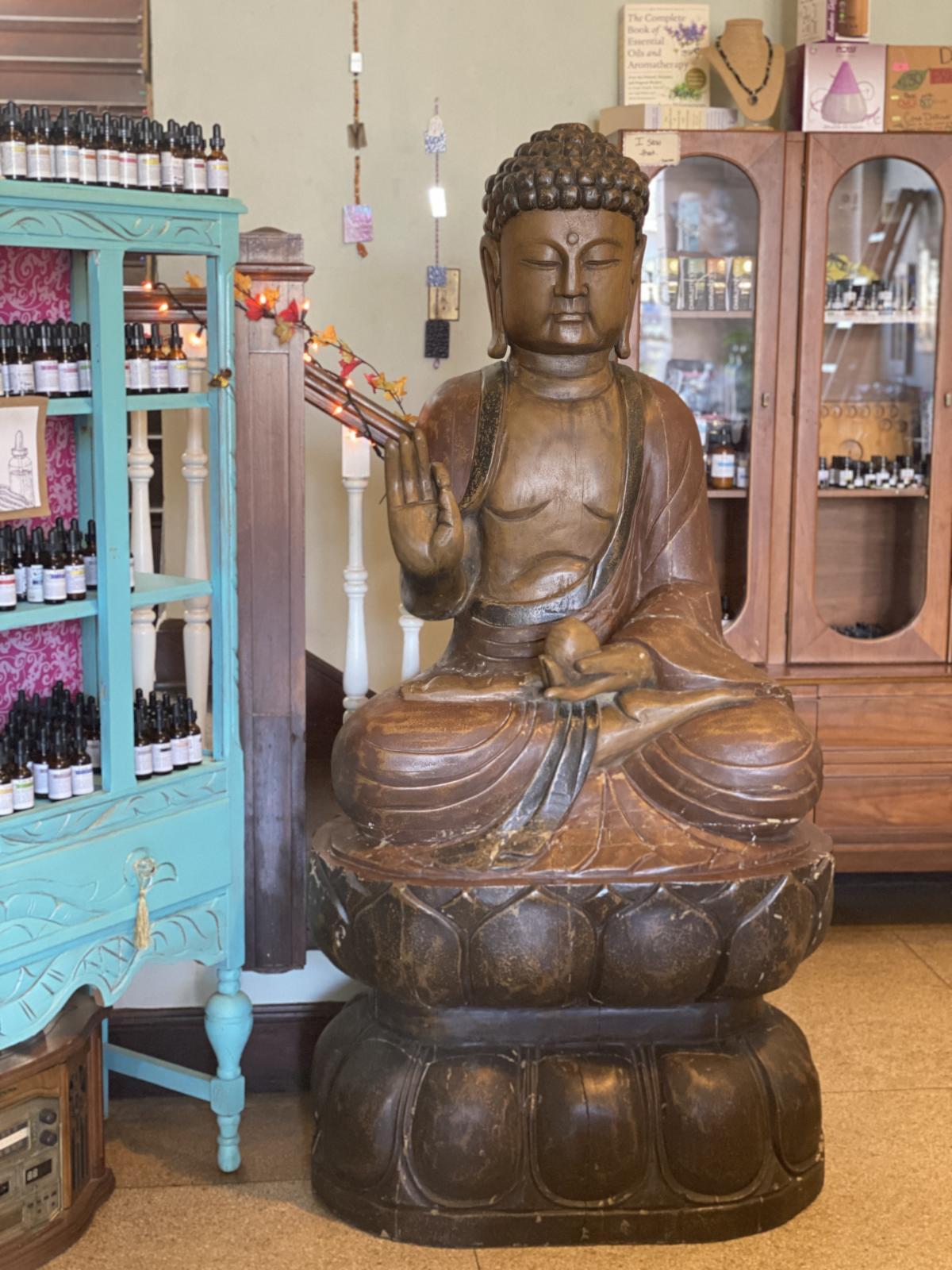 Large Wooden Buddha At Down to Earth In Beaumont, TX