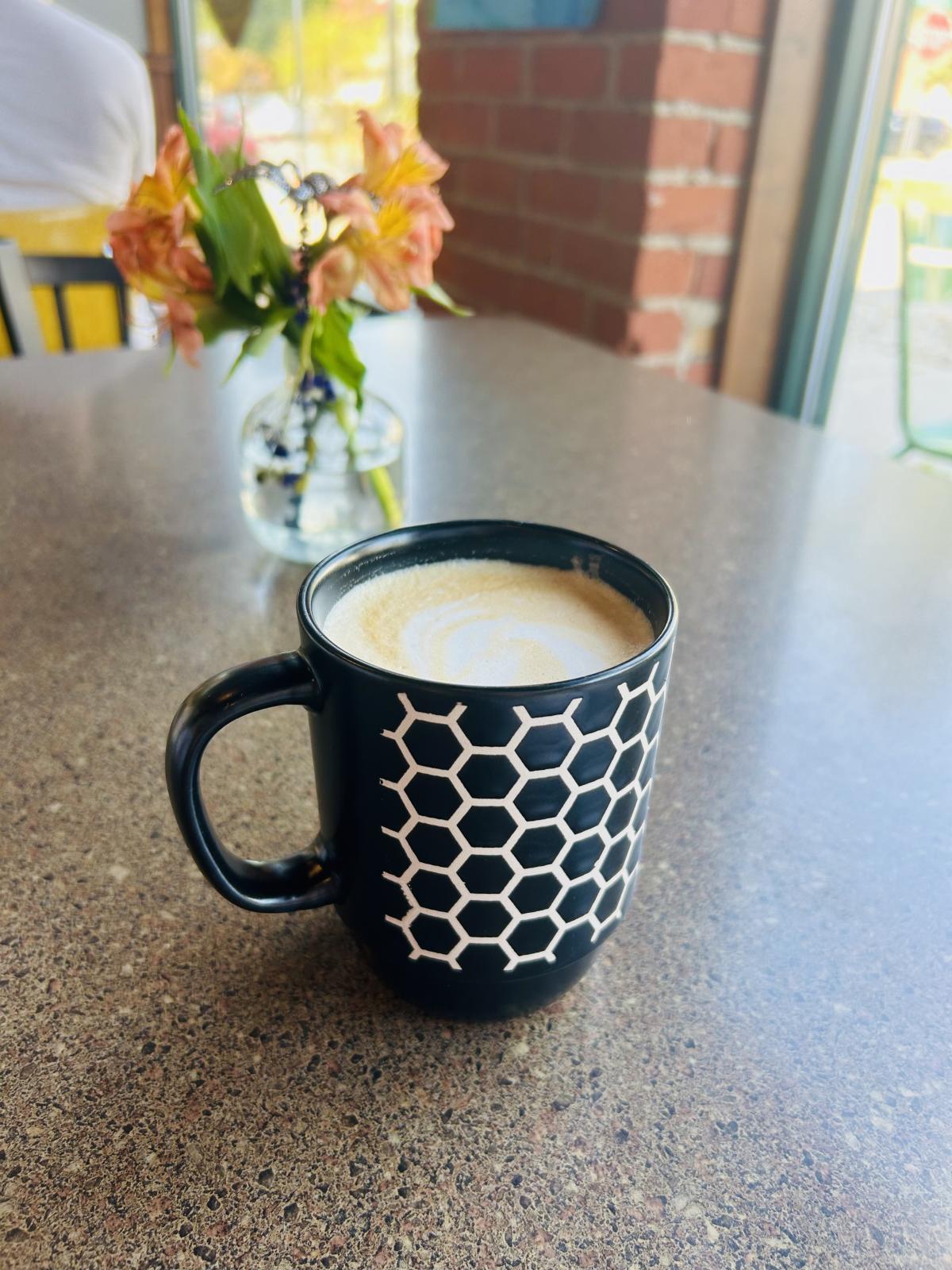 Coffee from Friendly Fox by Halloween flowers