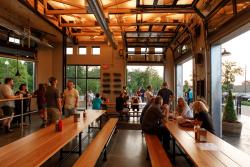 Long wooden bench tables at Goshen Brewing Company in Goshen, IN