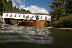 Drift Boat on the McKenzie River in front of Goodpasture Covered Bridge