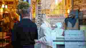 Couple window shopping in Downtown Frederick