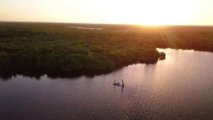 Aerial shot of Capt. Jay Withers fishing at sunset