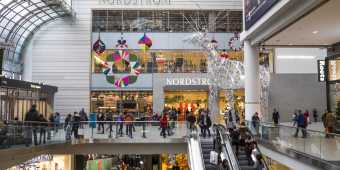 Holiday lights and decor inside the Toronto Eaton Centre in winter