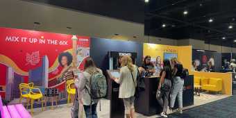 Mix it Up in the 6ix EMS activation booth with attendees