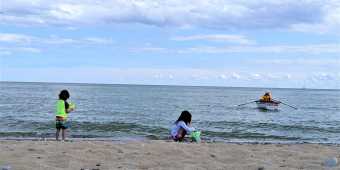 Children on the sand at Woodbine Beach in Toronto
