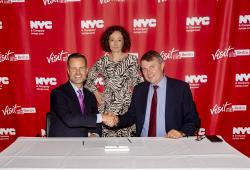 NYC & Company signs a brand new city-to-city tourism partnership with visitBerlin during an event at the German Consulate General New York. Pictured (L-R): Fred Dixon, NYC & Company President and CEO; Ramona Pop, Deputy Mayor / Senator for Economics, Energy and Public Enterprises of Berlin; Burkhard Kieker, CEO of visitBerlin. Photo Credit: Brittany Petronella/NYC & Company.
