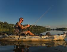 Vincent Stuter of Anglers Anchor in a Kayak Fishing on the River.