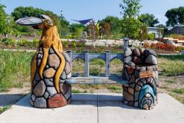Carved Bench with gnome and dragonfly