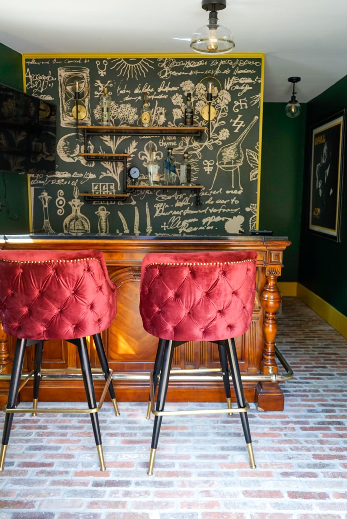 red velvet chairs at a bar