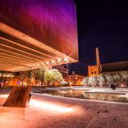 Purple Light Reflecting off Everson Museum At Night
