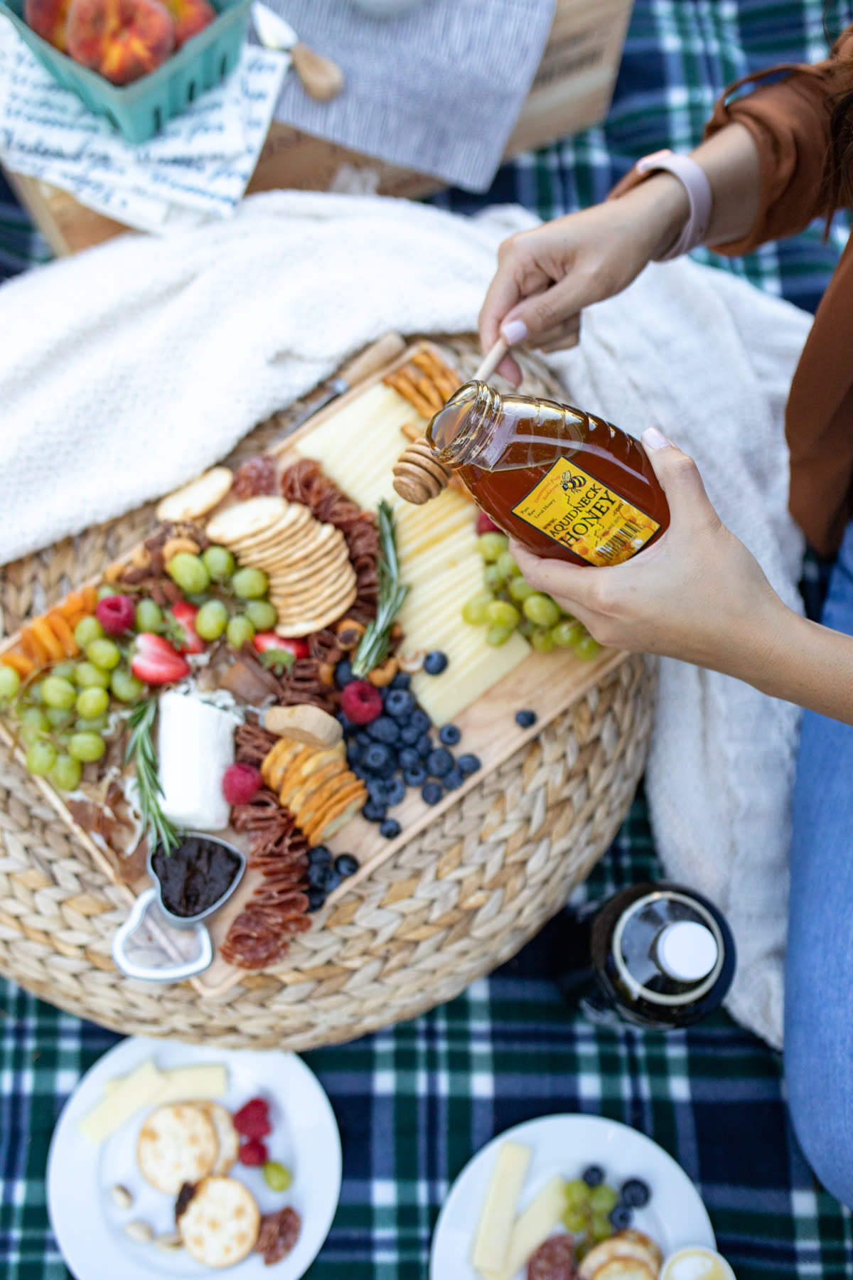 Person Spinning Honey At A Picnic In Newport, RI