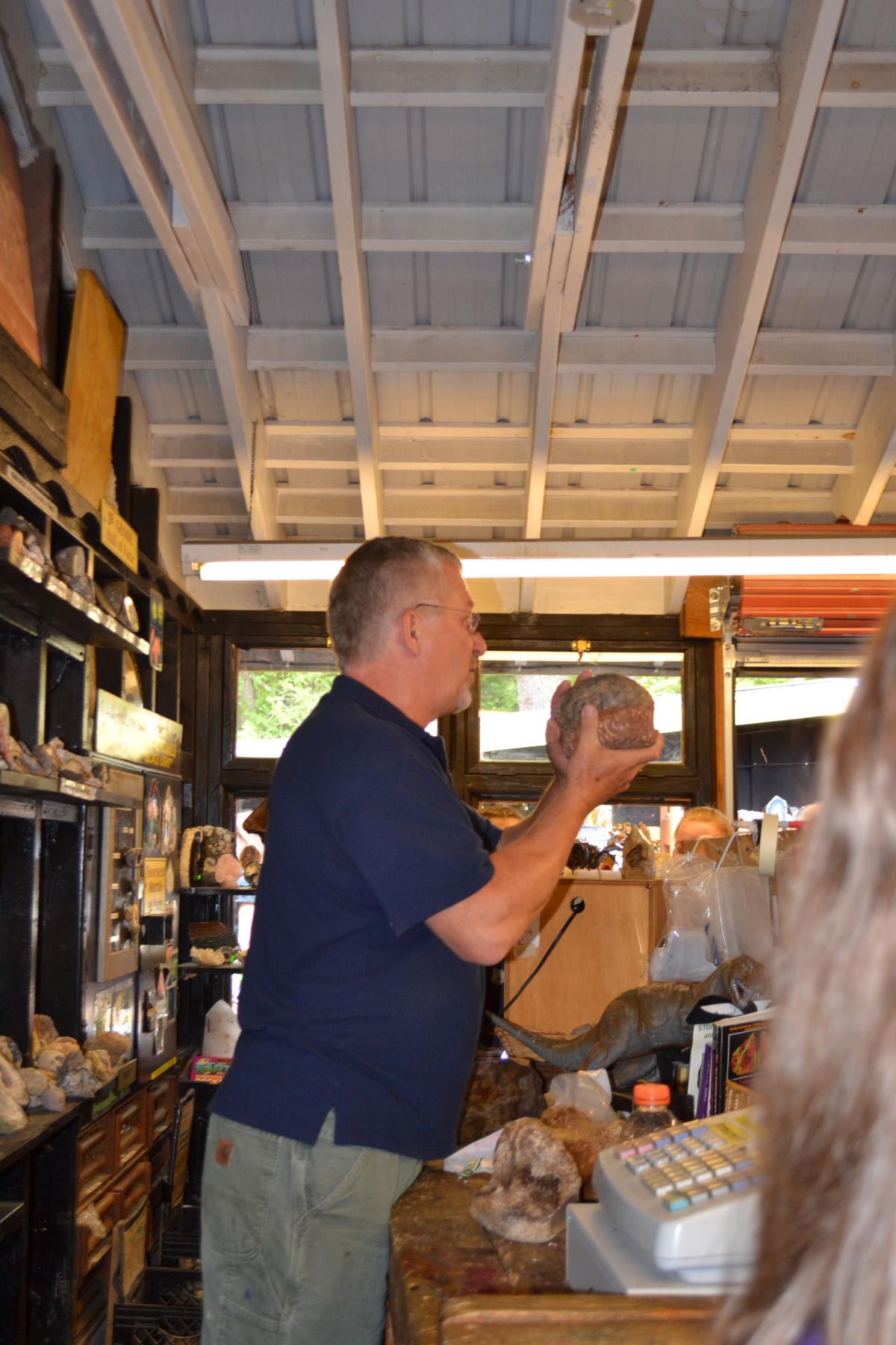 Greg Beckler and a fossilized dinosaur egg