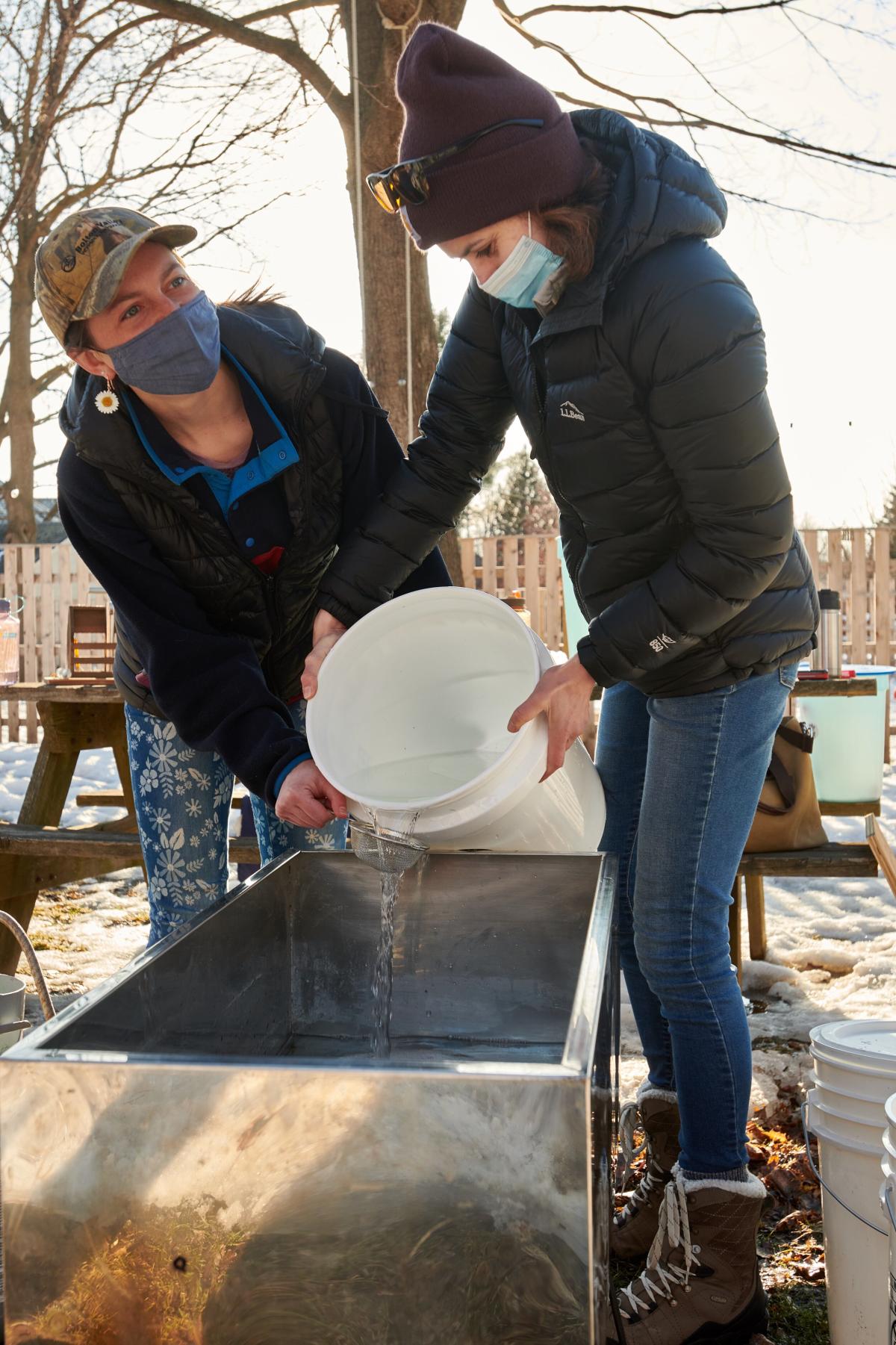 Sisters Maeve and Wynne Poleman, who are part of the Tap O.N.E. team and educators in the Winooski school system, had access to a portable evaporator, sap buckets, and sugaring gear through their father, Professor Walter Poleman. Professor Poleman, an ecologist and senior lecturer at the Rubenstein School of Environment and Natural Resources at UVM, has done extensive work around place-based education, an approach to teaching that uses the local landscape, culture, and heritage as a foundation for learning. Professor Poleman is the one who encouraged the group to create more engagement with the community through sugaring. “In a lot of my work recently, I’ve been partnering with the City of Burlington on this idea of being able to use the city as classroom,” he explains. “Sugaring just becomes an awesome opportunity to build a culture-nature connection at any scale.” - 