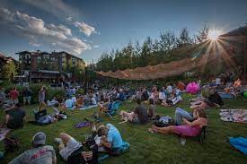 people sitting on grass