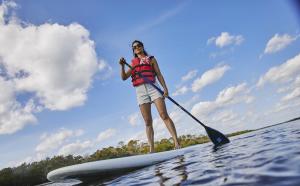 Woman paddleboarding