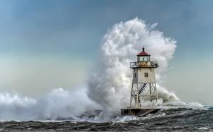 Storm Season - wave breaking over lighthouse - by David Johnson