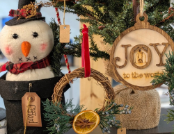Shops on Old Trail Holiday Items for sale at the shop. Hand stitched snowman, artisan crafted ornaments, and so much more!