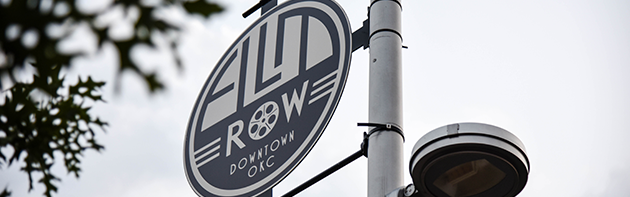 Image of the sign (reading: Film Row Downtown OKC) in the Film Row District in Oklahoma City.