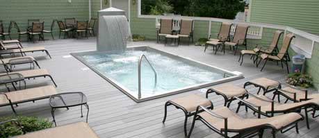 A heated spa pool with waterfall is on the sun deck at Mackinac Island’s Inn on Mackinac hotel.