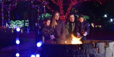 Family Making Smores at Winter Lights